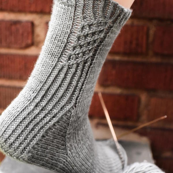 Gray cabled knit sock